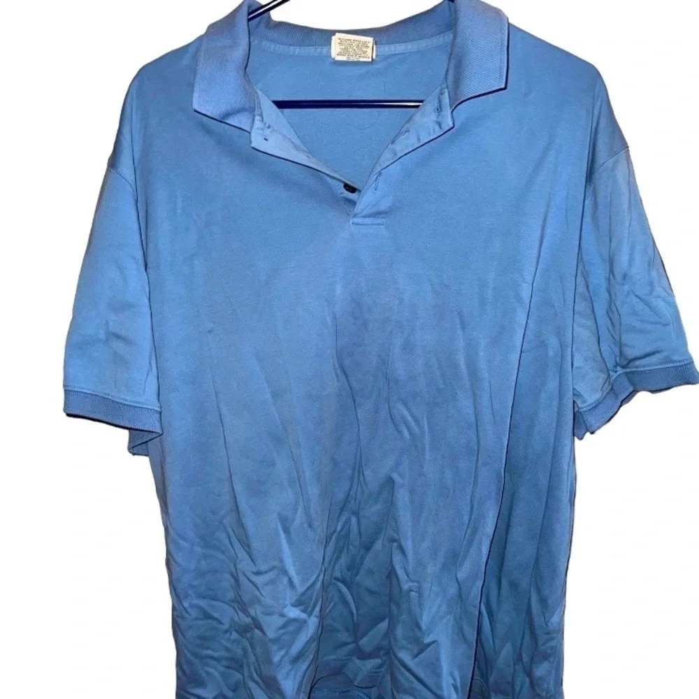 L.l. Bean polo shirt, light blue, XL, wrinkled from being folded, lots of life!